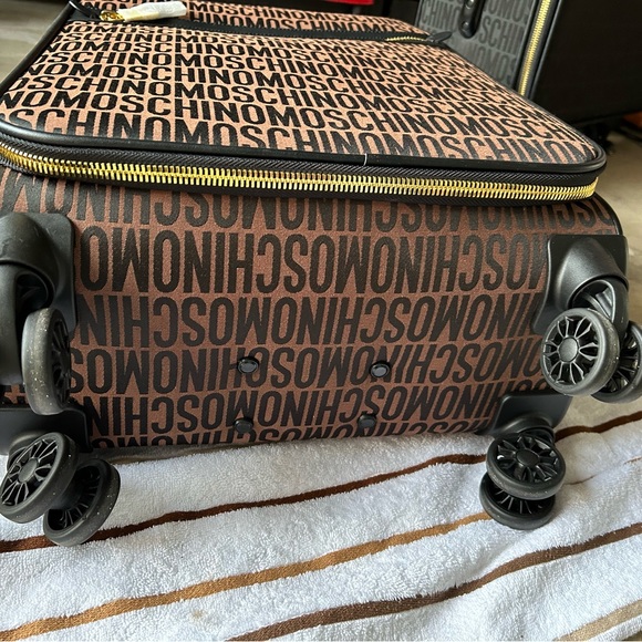 Moschino 18 Inch Logo Spinner Swuitcases each sold separately 500each or 900both - Picture 7 of 10